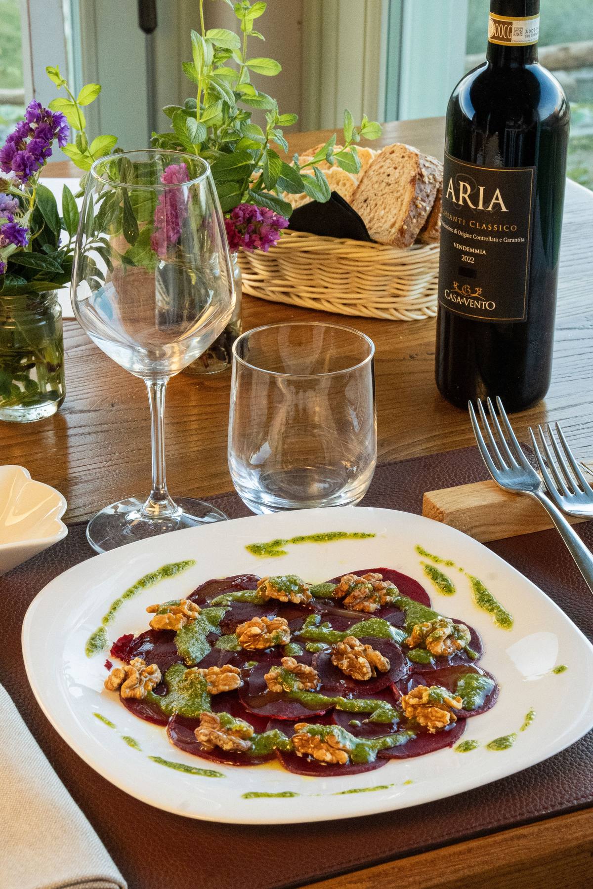 Beetroot carpaccio with walnuts and herb dressing