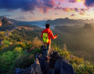 backpacker-standing-sunrise-viewpoint-ja-bo-village-mae-hong-son-province-thailand_335224-1356
