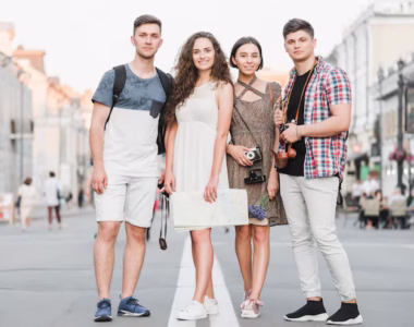 young-people-standing-street-with-map-camera_23-2147846964